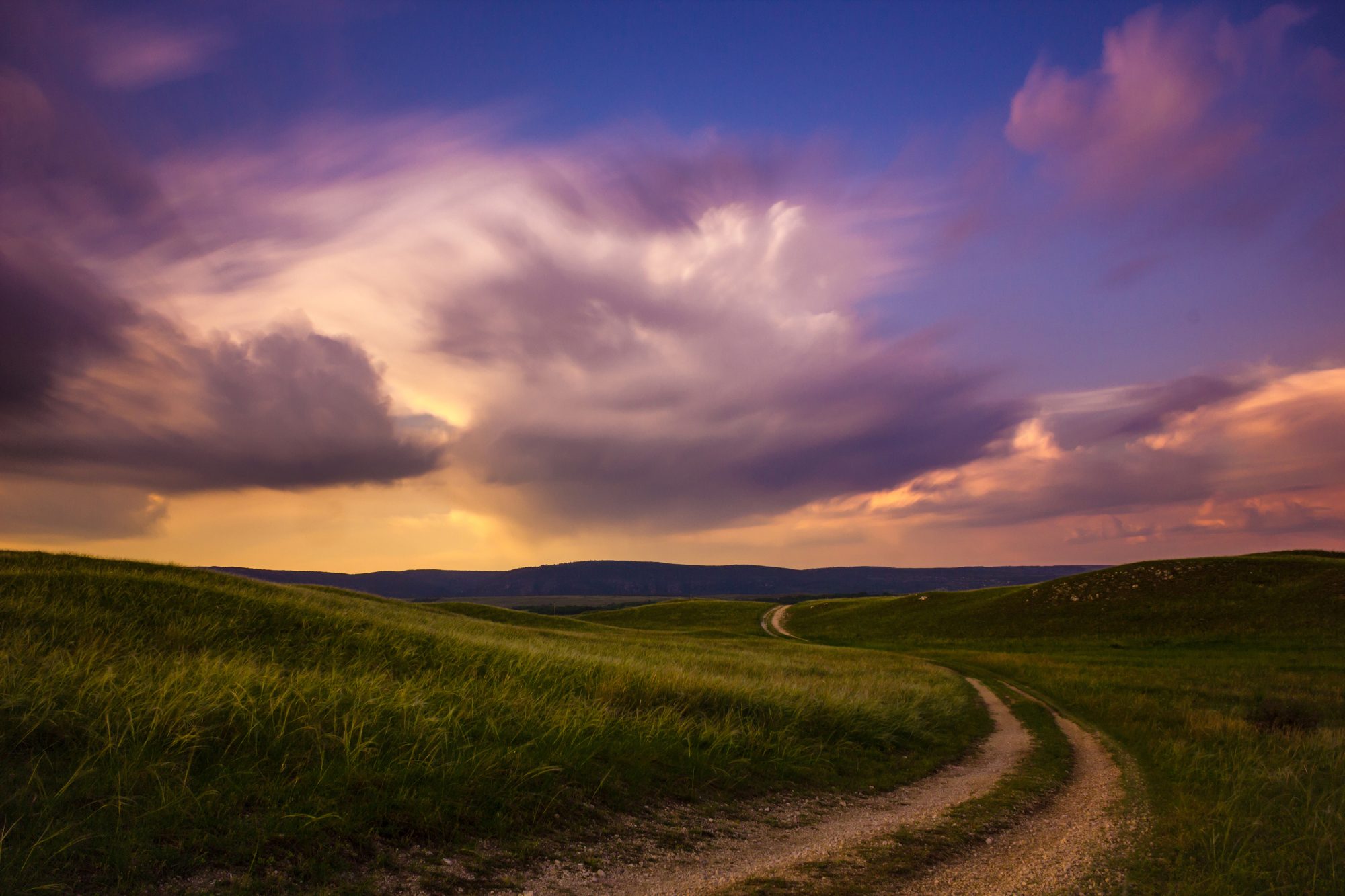 Lonesome,Road,With,Blurry,Clouds